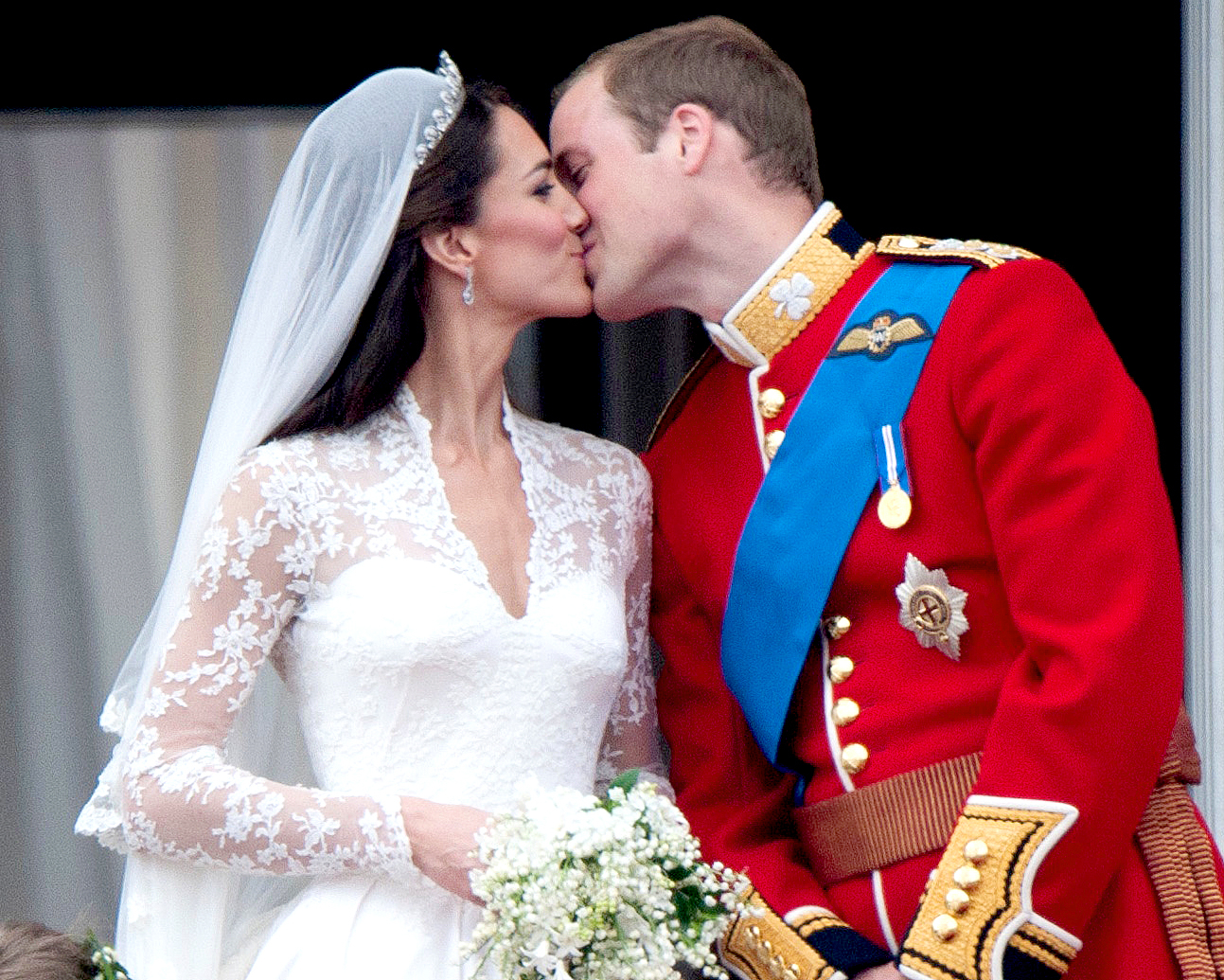 Catherine, Duchess of Cambridge and Prince William, Duke of Cambridge on the balcony at Buckingham Palace following their wedding at Westminster Abbey on April 29, 2011 in London, England.